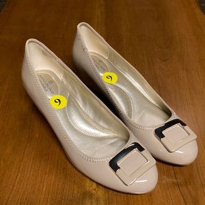 Beige/tan Bandolino flats. Worn once. Super comfortable. Padded & slight wedge